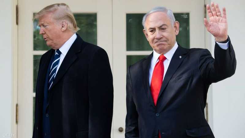 Two men in suits and ties waving at each other.